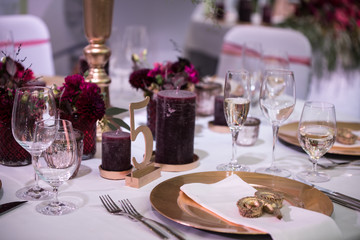 elegant purple, gold and white table setting