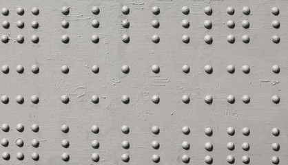 Grunge white metal iron texture background with buttons and space for text or image