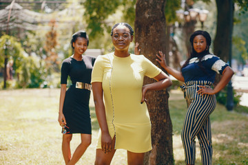 Stylish black girls in a park