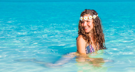 Happy girl at topical beach , Maldives.