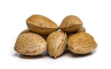 isolated unpeeled almonds