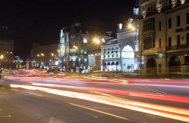 Fototapeta na wymiar Traffic of cars in Moscow city center at night (Teatralny Proezd), Russia