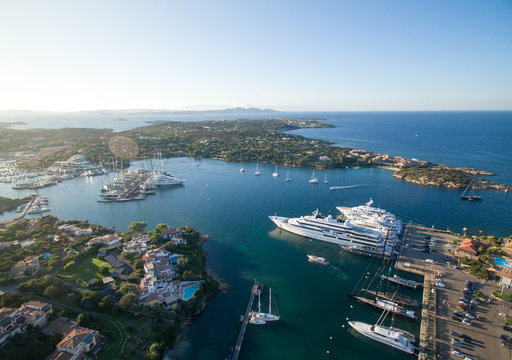 Panorama of the coastal part of Porto Cervo. Aerial view of the yacht parking, Italy