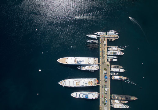 Top-down view of mega yachts in Porto Cervo, Italy