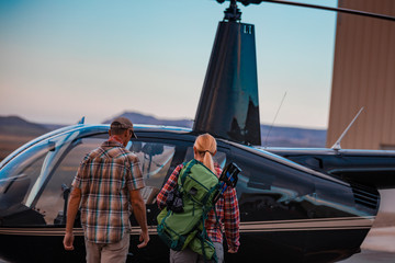 Woman Taking A Helicopter Hiking Tour In The Remote Deserts Of The Utah Canyonlands