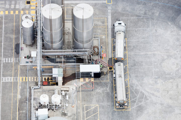 Industrial Refinery Depot With Trucks Waiting