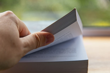 A man opening a reading book. Education concept image. 