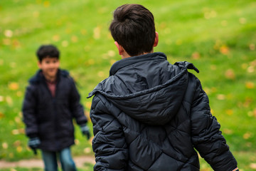 Fototapeta premium kids playing in park