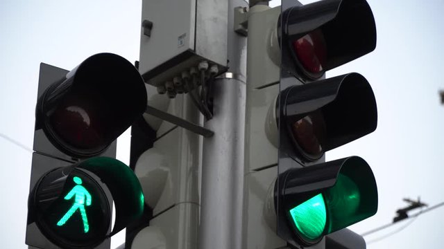 Stoplight. Traffic lights work in a big city at a crossroads.