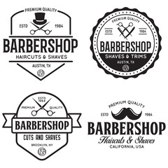 Obraz premium Set of vintage barbershop labels. Templates for the design of logos and emblems. Collection of barbershop - symbols razor, pole, scissors.