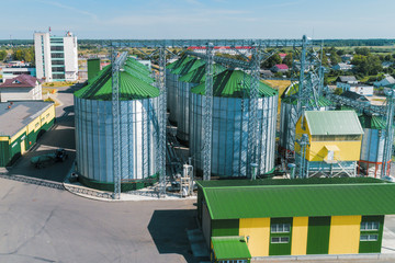 The modern granary. Metal silos with green roofs.
