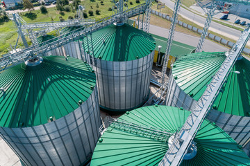The modern granary. Metal silos with green roofs.