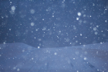 snow and fog on the winter road landscape / view of the seasonal weather a dangerous road, a winter lonely landscape