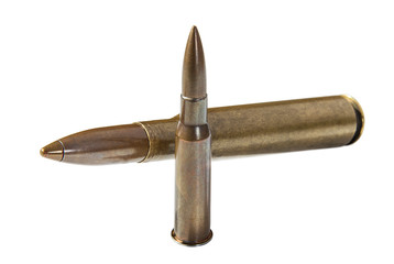 Rifle cartridges with copper bullets on white background