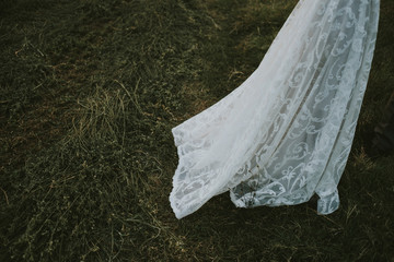 Bride's dress in grass