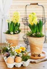 Easter floral arrangement with ordinary paper egg box