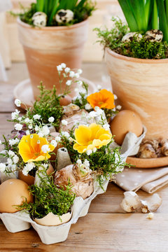 Easter floral arrangement with ordinary paper egg box