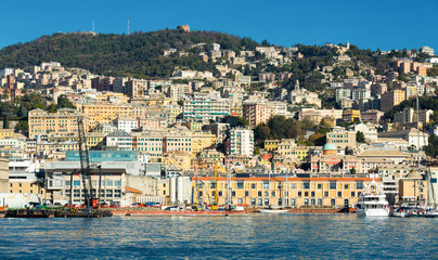 Fototapeta na wymiar Image of colorful houses near Old Port of Genoa in Italy