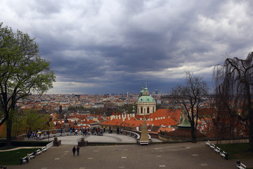 Fototapeta premium Prague view / panoramic landscape of the czech republic, Prague view with red roofs of houses from above, landscape in the European capital