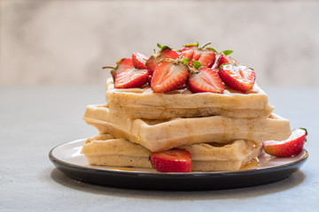 wholegrain waffles with strawberry and honey