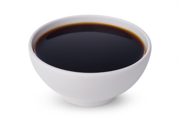 A tasty black soy sauce in bowl isolated on white background