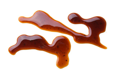 Puddle of tasty soy sauce isolated on a white background