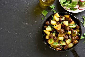 Fried potatoes with mushroom and sausage