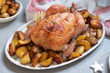 Whole roasted chicken with potato