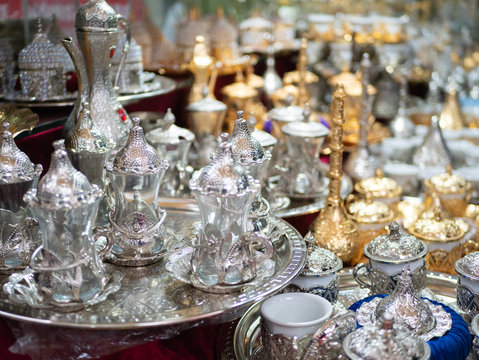 many silver and gold tea coffee sets