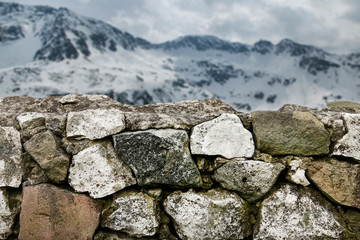 Stone wall in the mountains.