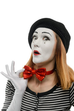 Funny female mime on white