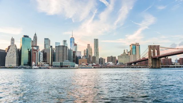 4k timelapse, time lapse of New York City Manhattan, financial district skyline, cityscape at Brooklyn bridge park, from day to dusk, twilight, sunset, illuminated street, lights, skyscrapers