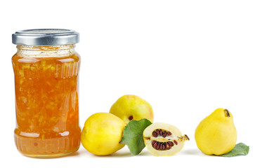 Glass jar with maules quince (Chaenomeles japonica) jam isolated on white background