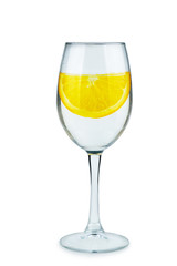 Wineglass with water (or alcohol) and lemon slice