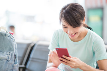 woman use phone happily