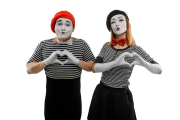 Mimes making a heart shape
