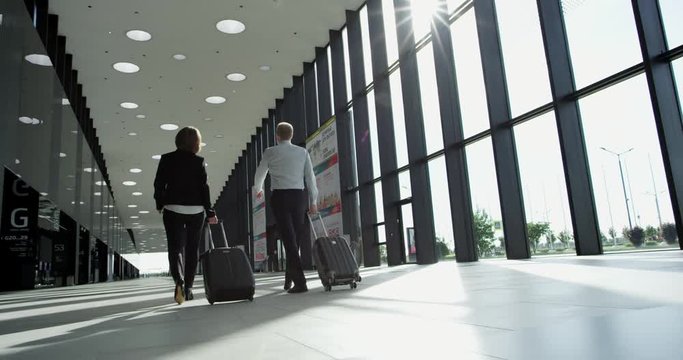 Business people walking in airport