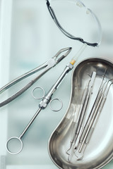 Closeup of a modern dentist tools, burnishers with blurred background