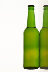 Set of two green longneck beer. White isolated background.