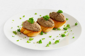 pate made of honey agarics, porcino, onion, garlic, cream cheese and brendy on fried slices of white bread