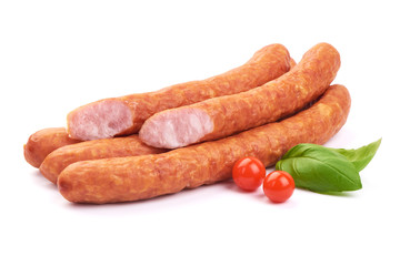 Sliced Sausages For Beer. Oktoberfest sausages with basil leaves, isolated on a white background. Close-up