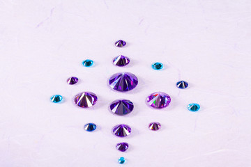 Blue Sapphire diamonds on the white background 