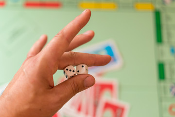 man holds the dice. Hand with dice
