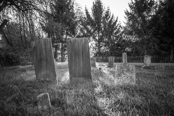 Old cemetery and tombstones in rural town of Wantage, NJ, from 1800's, black and white