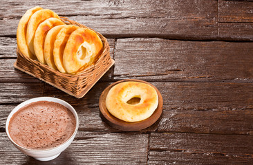Pandequeso traditional Colombian food - Hot drink chocolate