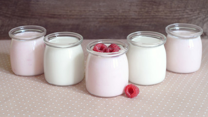 yogurt jars and fresh raspberries