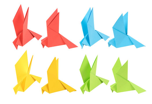 set of origami in the form of a dove of four colors in two angles