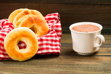 Pandequeso traditional Colombian food - Hot drink chocolate