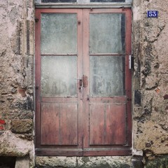 old wooden door in wall