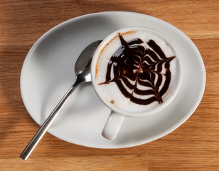 top view a cup of coffee and spoon